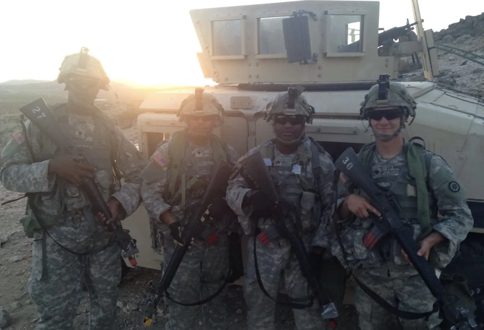 A group of soldiers standing next to each other.